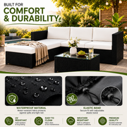 Weather-resistant black rattan corner garden sofa set with white cushions, footstool and glass coffee table