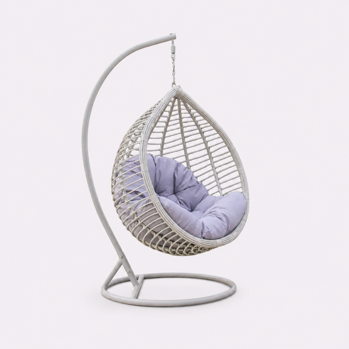 White hanging egg chair with cushioned seat and freestanding curved stand for garden patio and indoor seating