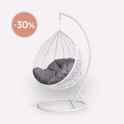 White wicker egg swing chair with grey cushion and freestanding metal frame for indoor and outdoor use